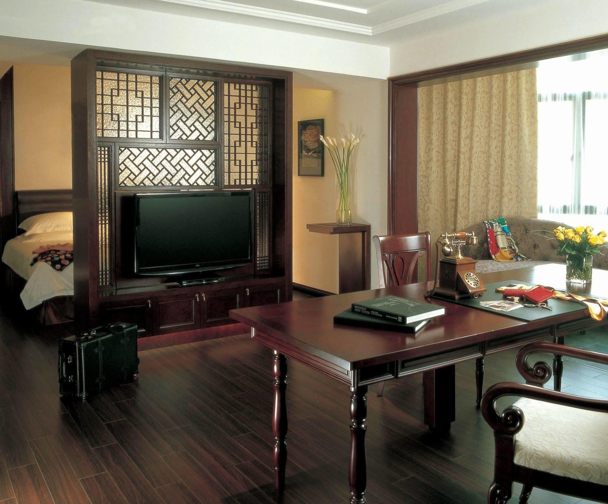 @ Gallery Suites Xangai Quarto foto